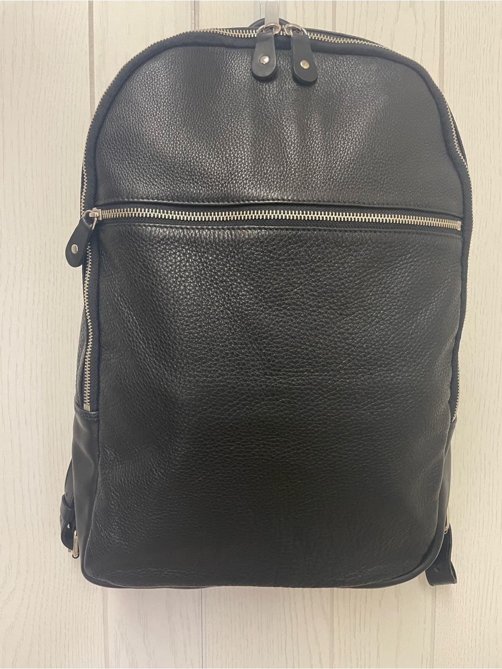 Roots Pebbled Black Leather Backpack with Silver Zippers